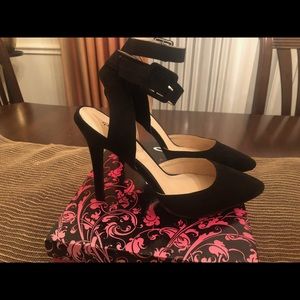Cute black velvet ankle strap heels.